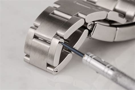 adding links to Rolex watch